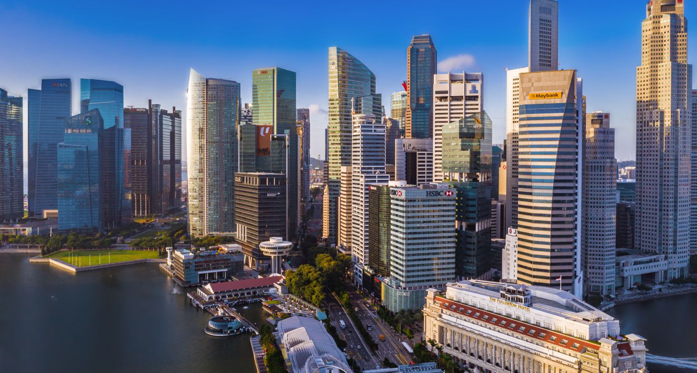 Aerial view Singapore City financial district and business building [Photo: Shutterstock]