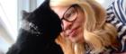 Photo of Enni Miller with her black cat