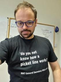 Young man wearing a slogan t-shirt