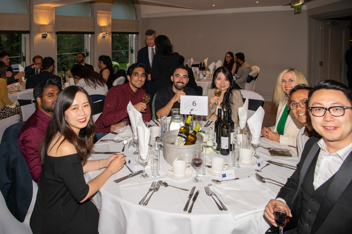 MBA Reunion Dinner guests at a table