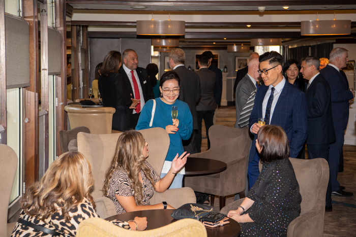 Guests talking at the 2022 MBA reunion dinner