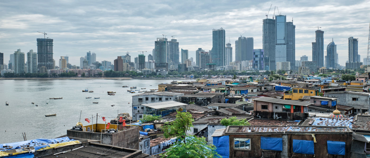 View of Mumbai skyline with skyscrapers over slums in Bandra suburb.