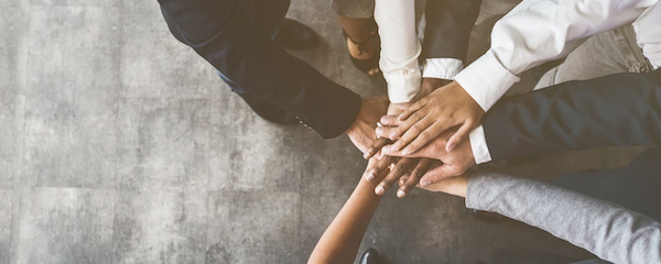 Image of hands indicating collaboration