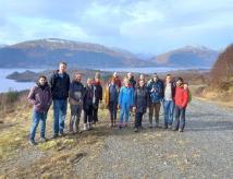 Image of Pat Monaghan's research group on a walk in a mountain area