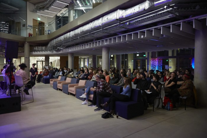 Large audience on ground floor of ARC