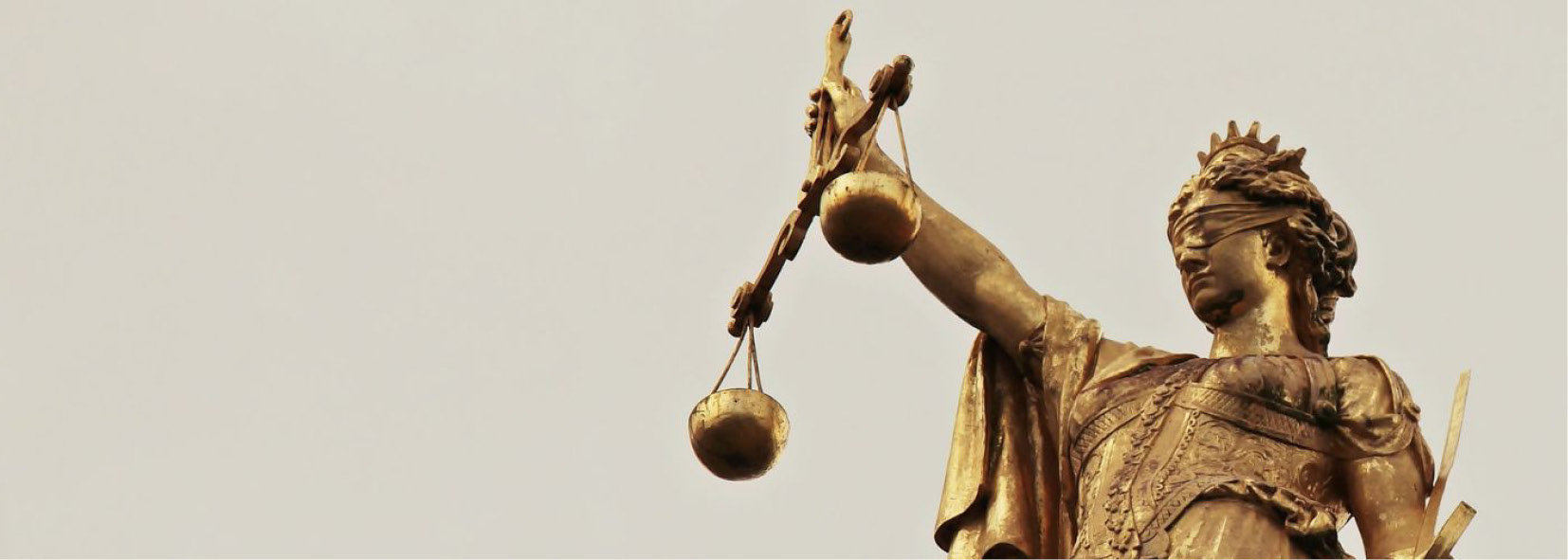 Justice status with scales of justice