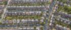 Aerial view of lots of small houses, roads and gardens Source: samuel foster | iStockphoto https://www.istockphoto.com/photo/residential-houses-drone-above-aerial-view-blue-sky-with-park-and-greenery-gm957484092-261450059