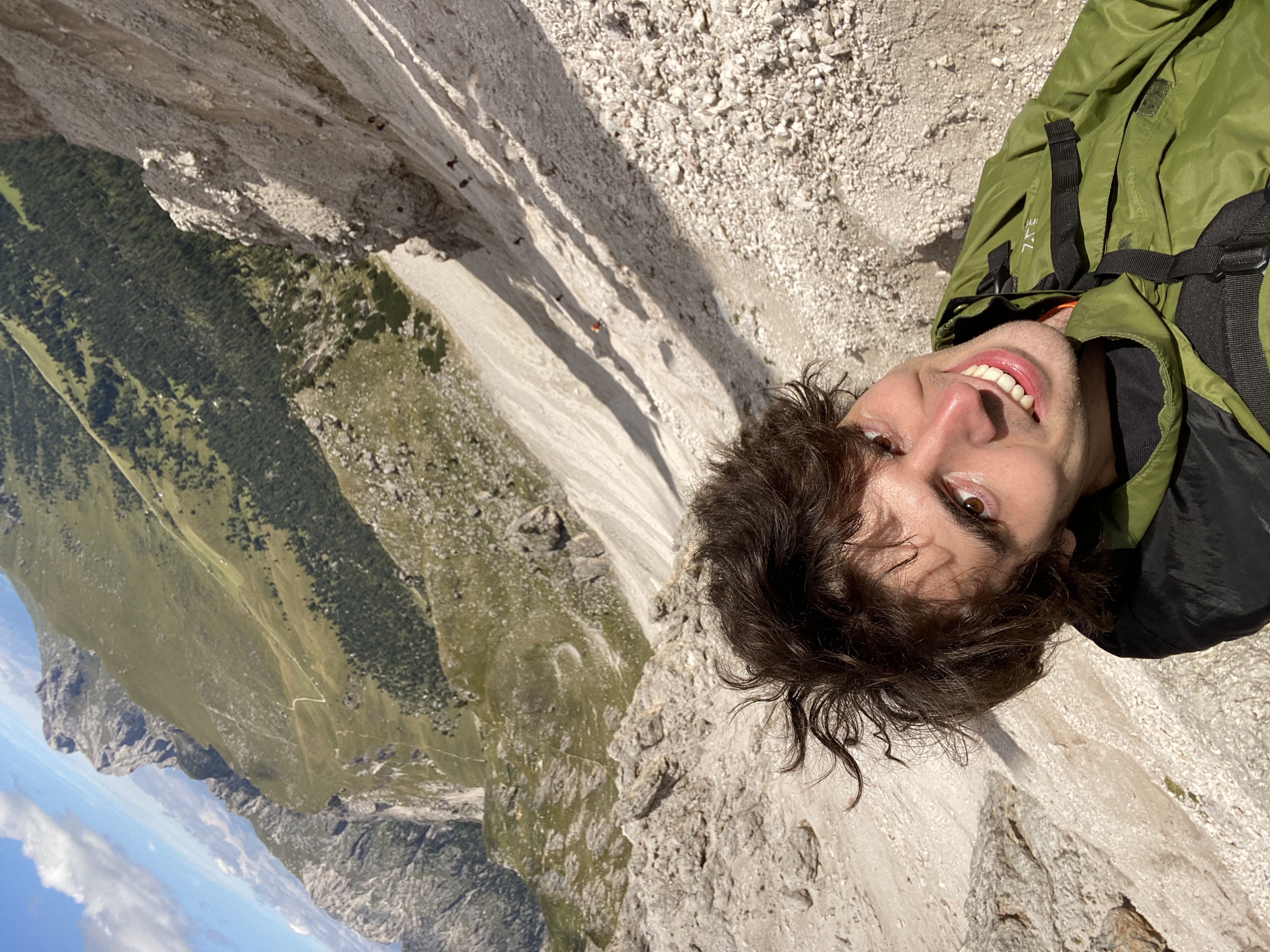 Me standing atop a craggy slope