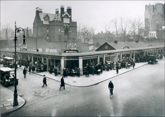 Photograph of the temporary Food Department following fire which burnt the east Wing of the Main Building (south side Kensington High Street). The Department was erected on allotment sites, which later became the John Barker Crown Site building and now house 