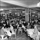 Photograph of customers sitting at tables in the restaurant involved in the Whist Drive, c1958.  (GUAS Ref: HF 51/6/1/6/2. Copyright reserved.)
