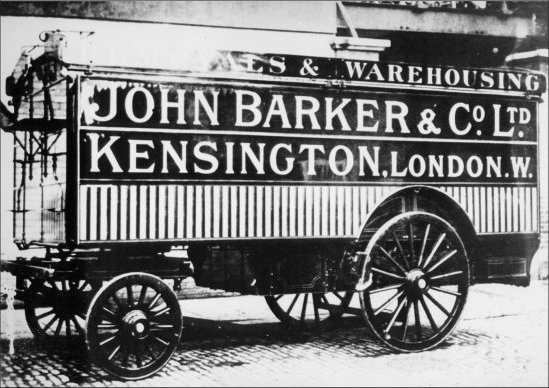 Photograph of a typical John Barker Van about 1910-1912.  Horse drawn trailer van, having metal tyres, used in the early days in connection with the Removals and Warehousing section of the business.  (GUAS Ref: HF 51/8/1/1/3 photo 10. Copyright reserved.)