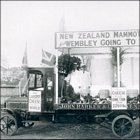 Mammoth New Zealand Cheese.  Purchased by John Barkers from the Wembley exhibition: Cheeses loaded ready for transportation to the store in Kensington, 1924.  (GUAS Ref: HF 51/8/1/1/3 photo 13. Copyright reserved.)