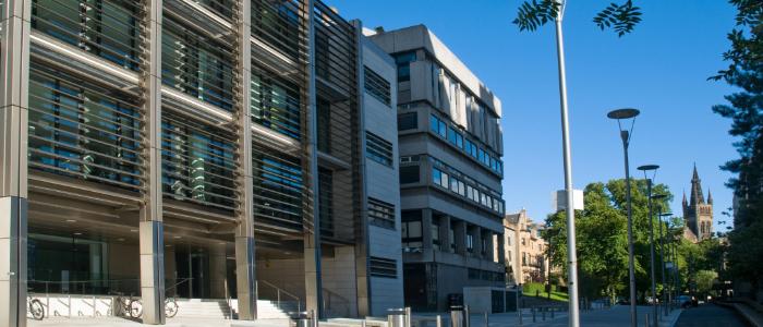 Sir Alwyn Williams Building with blue sky and trees