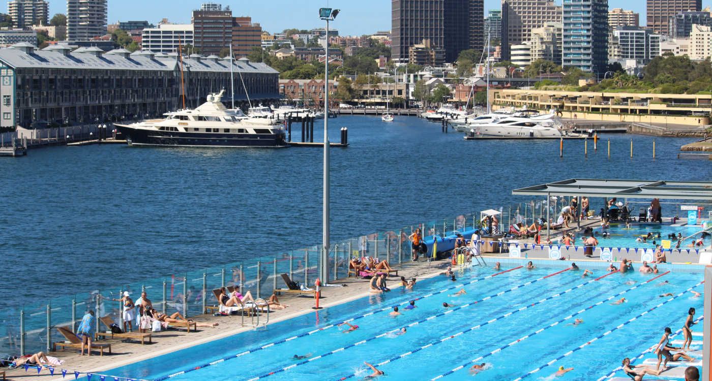 Andrew Boy Charlton Pool outdoor swimming pool in the foreground with Woolloomooloo in the background [photo: Shutterstock]