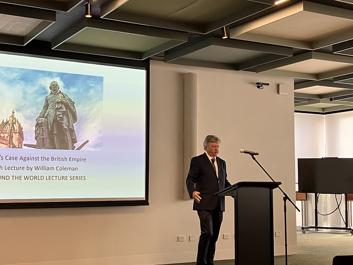 Speaker at podium with opening slide entitled 'Adam Smith's Case Against the British Empire'Source: Australian National University