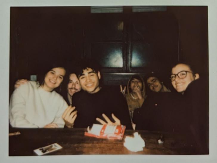 Study Abroad Students with a polaroid
