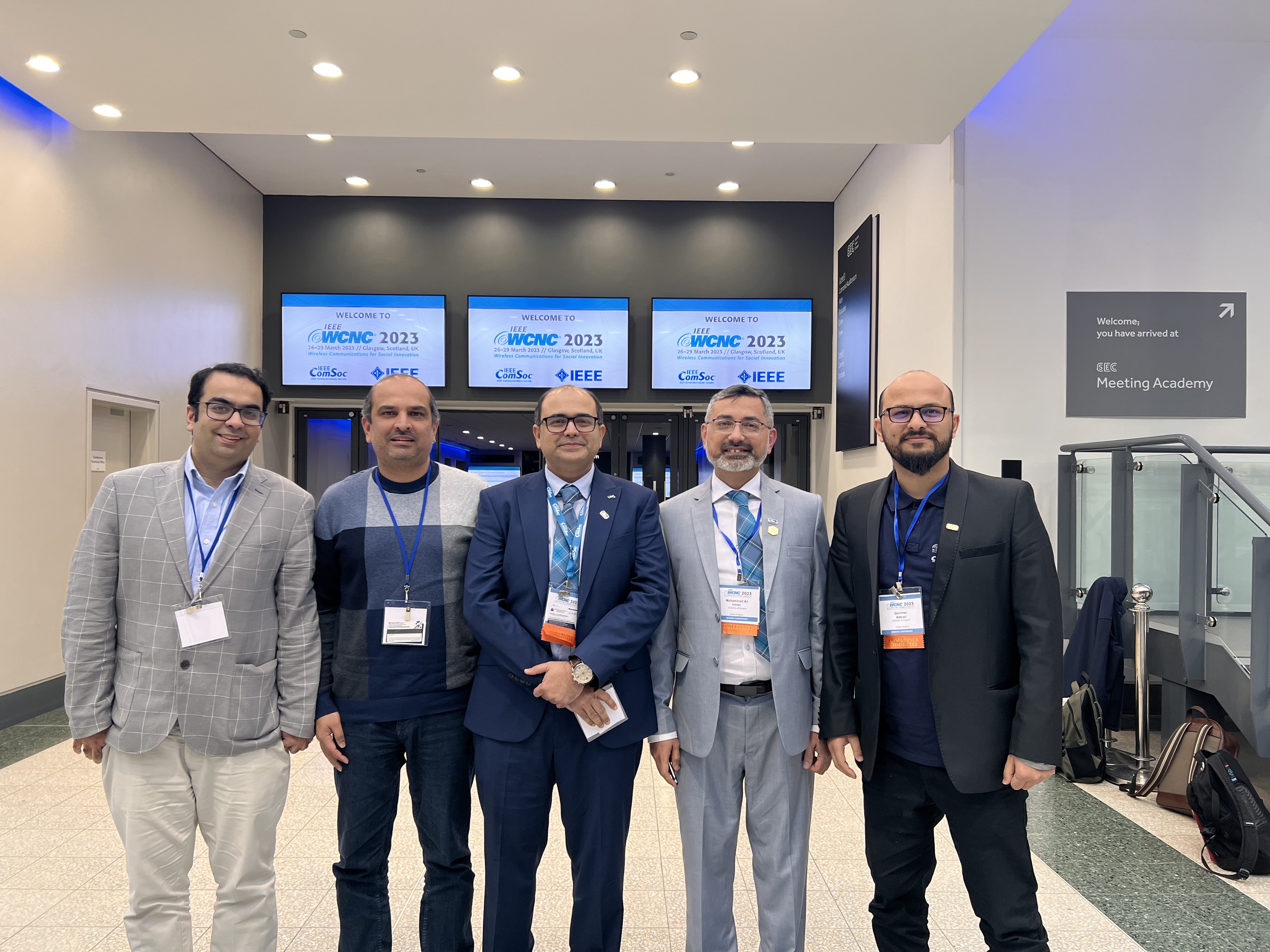 Professor Muhammad Imran, Dr Qammer Abbasi and colleagues at the 2023 IEEE WCNC