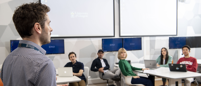 Man talking to a classroom of people