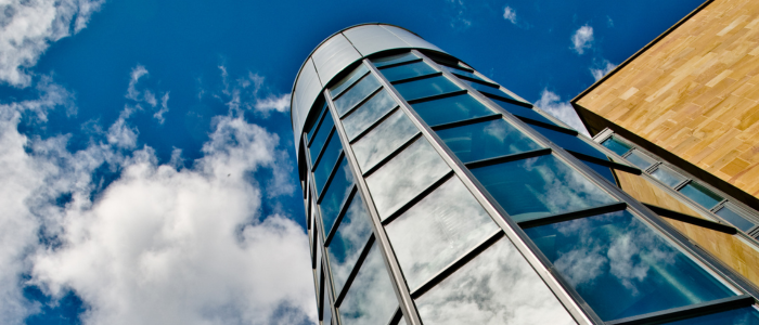 British Heart Foundation and Biomedical Centre building tower on a cloudy day