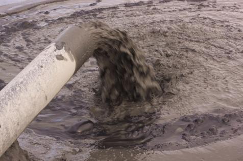 Pipeline decanting thiocyanate-contaminated wastewater from gold ore processing plant