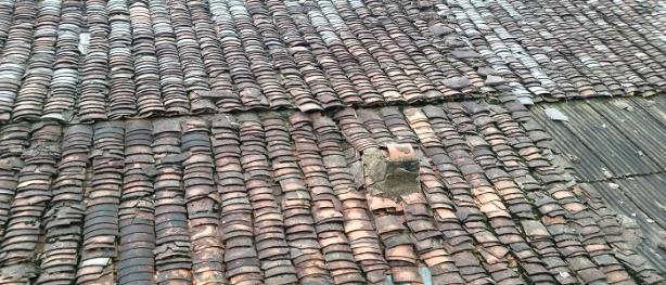 Roof tiles with some missing 