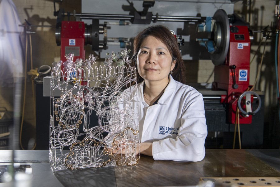 Dr Ayako Tani with glass artwork