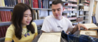 Students Wanyaporn 'Wendy' Kwangsue and Shaun Turner views the Adam Smith artefacts.