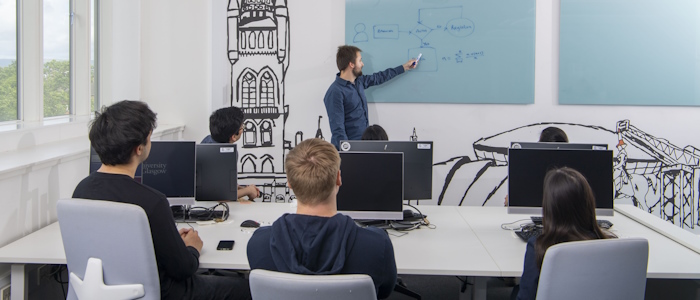 Students sitting in a computing class