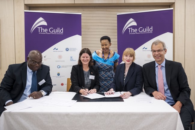 UofG VP Rachel Sandison signing GUILD Clusters of Excellence