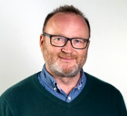 A head and shoulders profile shot of Professor Mike Barrett