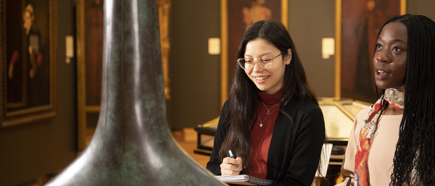 Two students discussing an exhibition at the Hunterian Gallery