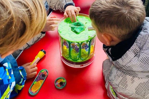 Kids interacting with the Sci-Seedlets educational tools