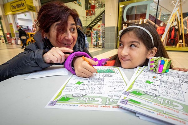 Kids interacting with the Sci-Seedlets educational tools