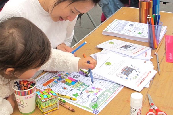 Kids interacting with the Sci-Seedlets educational tools