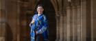 Dr Diana Gabaldon wearing the University of Glasgow tartan in the Cloisters at the University of Glasgow ahead of her lecture in the Bute Hall. Credit Martin Shields