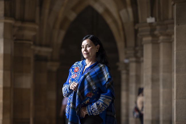 Dr Diana Gabaldon wearing the University of Glasgow tartan in the Cloisters at the University of Glasgow ahead of her lecture in the Bute Hall. Credit Martin Shields