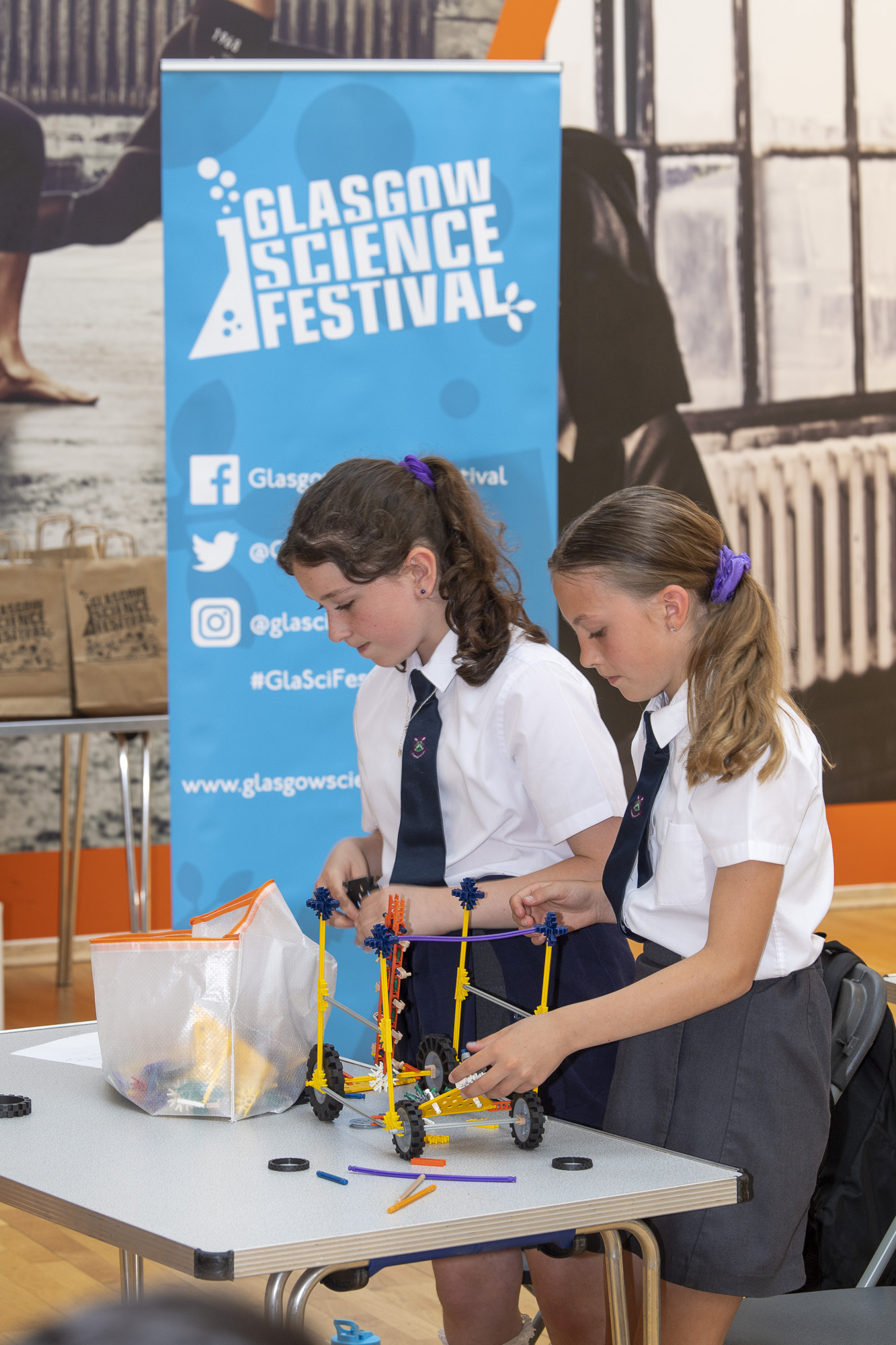 Photograph showing two participants of Creating Engineers 2023 whilst the challenge took place.