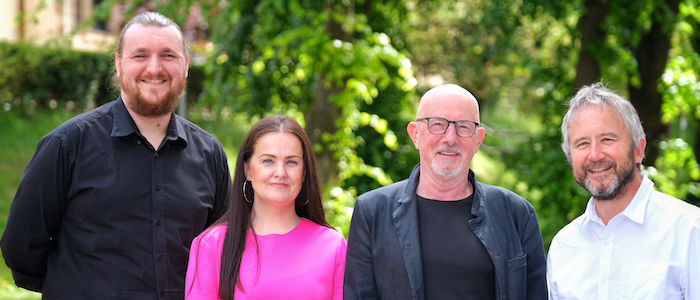 (l-r) Jack Parkinson, of the University’s School of Computing Science, STEM SPACE’s lead researcher; Aislinn Burke, from Glasgow City Council’s Glasgow’s Improvement Challenge team; Ewan Kirk, co-founder and co-chair of the Turner Kirk Trust; Professor Quintin Cutts, head of the University of Glasgow’s Centre for Computing Science Education and project director of STEM SPACE.
