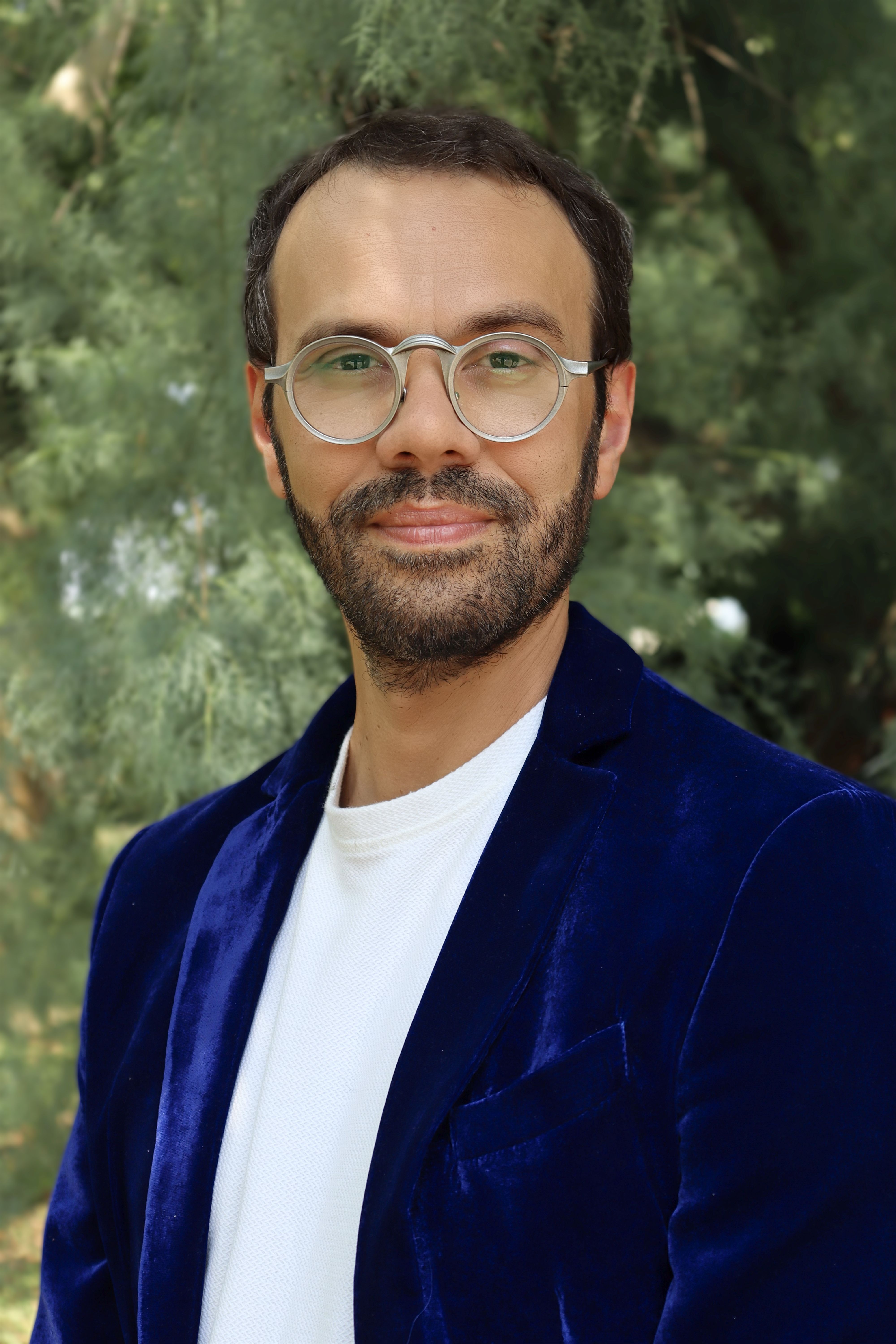 Portrait of a man in a blue velvet jacket