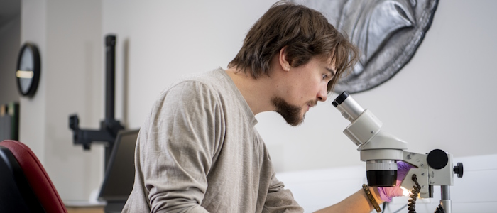 Male and female Researchers working in lab