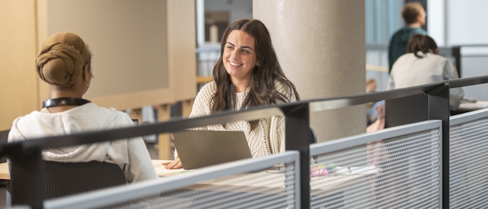 Students relaxing in the library