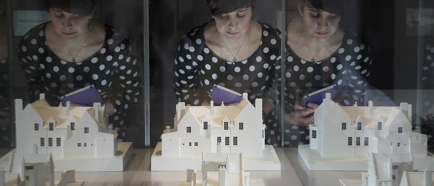 Student with Charles Rennie Mackintosh models.