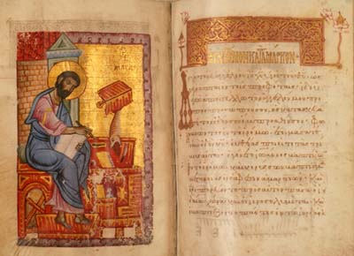 Douple page spread of opening of the Gospel of Saint Mark, with full page portrait on the left and opening of text on the right